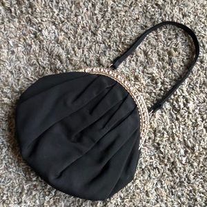 Vintage black purse marked MM inside